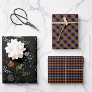 Ensemble de papier cadeau noir magnifiquement emmê