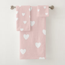 Ensemble rose et blanc de serviette de coeurs