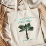 Entwined Palm Trees Wedding Welcome Tote Bag<br><div class="desc">Entwined palm trees wedding welcome tote bag with personalization. Curved text at the top: "Welcome to our wedding" with location printed in the centre over two entwined palm trees. At the bottom add names of the bride and groom with date of marriage celebration. Use in hotel rooms to welcome travelling...</div>