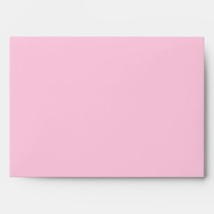 Enveloppe 5x7 rose à l'extérieur de l'enveloppe intérieure d