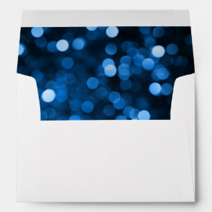Enveloppe A7 blanche à points lumineux bleus