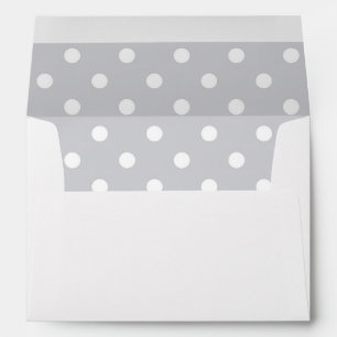 Enveloppe blanche, point de polka argenté rayé