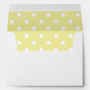 Enveloppe blanche, point de polka jaune rayé