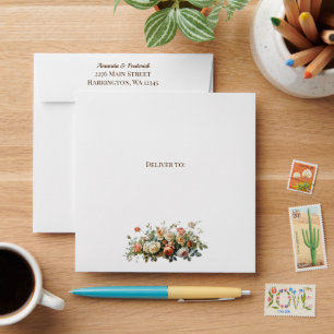Enveloppe de mariage avec arrangement floral bohèm