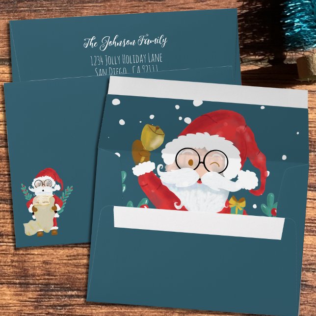 Enveloppe de vacances turquoise avec Père Noël mig (Festive Christmas teal envelope featuring watercolor Santa Claus .)