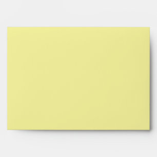 Enveloppe jaune avec un motif de nid d'abeille sur