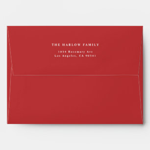 Enveloppe Rouge vif avec typographie classique et adresse de