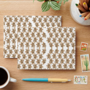 Enveloppe un arrière - plan blanc avec des fleurs marron