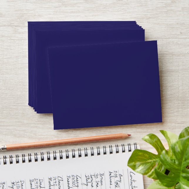 Enveloppe un arrière - plan bleu avec une horloge (Stacked)