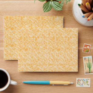 Enveloppe un arrière - plan jaune et blanc avec un petit poi