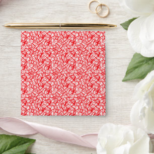 Enveloppe un arrière - plan rouge et blanc avec de petits po