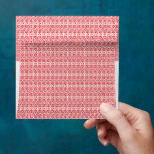 Enveloppe un arrière - plan rouge et blanc avec un motif