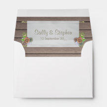 Bois rustique et faire-part de mariage fleuri