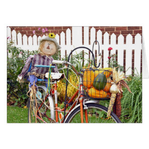 épouvantail d'automne à vélo