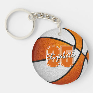 équipe de l'école blanche orange couleurs basketba