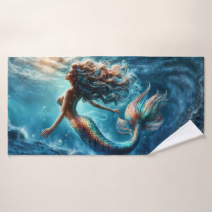 Ethereal aquatic mermaid beauty in deep blue bath towel