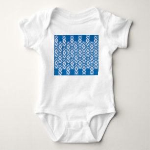 ethnic ornament on natural linen textile baby bodysuit