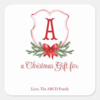 Étiquette cadeau de l'emblème de Noël de Red Bow -