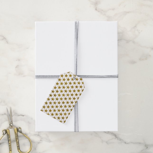 Étiquettes-cadeau Étoiles de parties scintillant d'or (Avec de la ficelle)