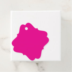 Étiquettes Cadeau un arrière - plan rose avec un