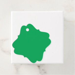 Étiquettes Cadeau un arrière - plan vert avec un