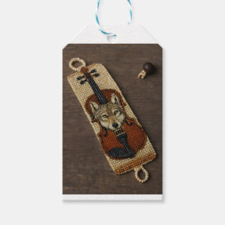 Étiquettes-cadeau Wolf sur un perlage de violon