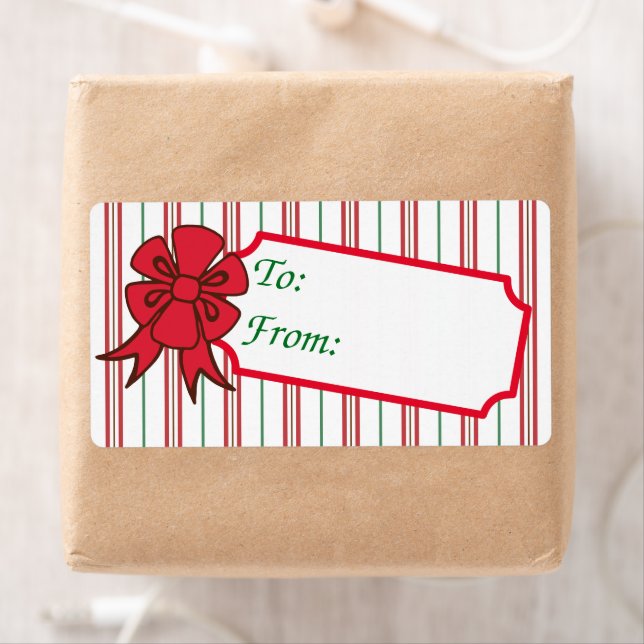 Étiquettes de cadeau avec nœud de Noël (En situation)