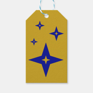 Étiquettes de cadeau dorées avec étoiles bleues