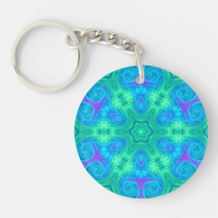 Étoile et boucles en bleu vert et rose