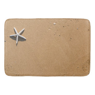 Étoiles de mer sur le tapis de bain de sable
