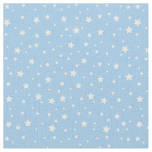 Étoiles sur le tissu bleu-clair
