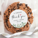 Eucalyptus A Sweet Thank You Favour Classic Round Sticker<br><div class="desc">Say "thank you" in a stylish way with this Simple Eucalyptus Thank You Favour Sticker! The sticker features a minimalist design with a watercolor eucalyptus sprig and the words "a sweet thank you" in a modern font. It is perfect for adding a personal touch to your wedding favours, such as...</div>