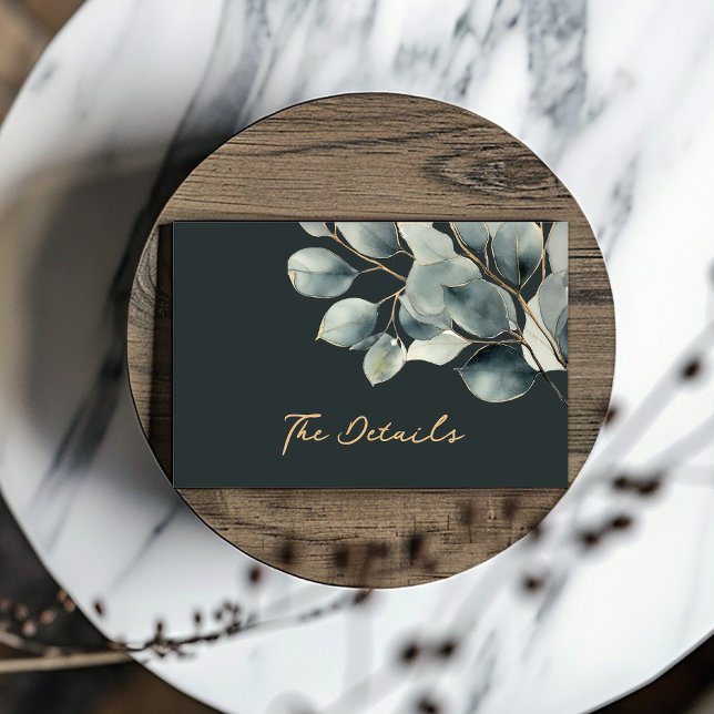 Eucalyptus branch, green leaves wedding enclosure (“The Details” in luxurious gold script, set against a delicate eucalyptus branch.)