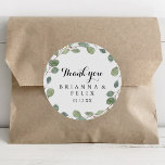Eucalyptus Calligraphy Thank You Wedding Favour Classic Round Sticker<br><div class="desc">This eucalyptus calligraphy thank you wedding favour classic round sticker is perfect for a rustic wedding. The design features hand-drawn botanical green eucalyptus branches and leaves. Make the sticker labels your own by including your names, the event (if applicable), and the date. These stickers can compliment a wedding reception, bridal...</div>