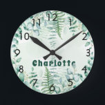 Eucalyptus greenery woodland forest name round clock<br><div class="desc">A green, white watercolored background. Decorated with eucalyptus greenery foliage and woodland fern. Personalize and add a name.</div>