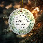 Eucalyptus Newlyweds 1st Christmas Mrs & Mrs Ceramic Ornament<br><div class="desc">For the Mrs. and Mrs. Lesbian Newlyweds. Customize the text and background colour for your event. Eucalyptus watercolor wreath can be scaled or removed. Photo on back.</div>