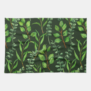Eucalyptus on dark green kitchen towel