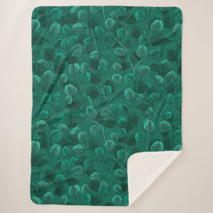 Eucalyptus on green sherpa blanket
