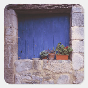 Europe, France, Cereste. A blue door adds colour Square Sticker