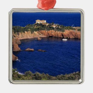 Europe, France, Theoule-sur-Mer. A tile-roofed Metal Ornament