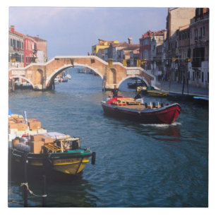 Europe, Italy, Venice. Boats bringing in Tile