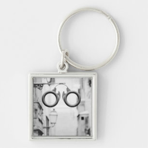 Europe, Spain, Mallorca. Eyeglass shop sign, Keychain