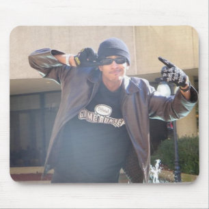 Evan in a leather jack and skull cap mouse pad