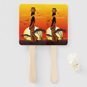 Éventail Une belle femme africaine Silhouette sur les solei
