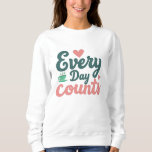 Every Day Counts Sweatshirt<br><div class="desc">Make a statement without saying a word. “Every Day Counts” is a minimalist design with a powerful message — perfect for those who live with purpose, lead with intention, and know that progress is built one day at a time. Ideal for educators, leaders, students, or anyone on a journey of...</div>
