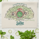 Everything Grows in THE SHIRE™ Kitchen Towel<br><div class="desc">Bring a little piece of Middle-Earth™ to your everyday with this charming Lord of the Rings™ design inspired by the cozy hills of Hobbiton. Featuring a storybook-style hobbit hole with its iconic round green door tucked into a lush hillside, the artwork is paired with the beloved phrase, “Everything grows in...</div>