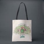 Everything Grows in THE SHIRE™ Tote Bag<br><div class="desc">Bring a little piece of Middle-Earth™ to your everyday with this charming Lord of the Rings™ design inspired by the cozy hills of Hobbiton. Featuring a storybook-style hobbit hole with its iconic round green door tucked into a lush hillside, the artwork is paired with the beloved phrase, “Everything grows in...</div>