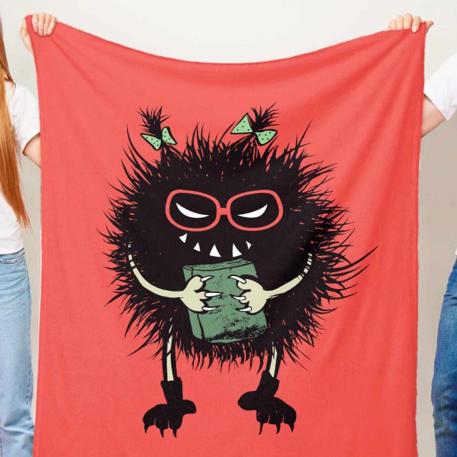 Evil Book Lover Character - Edgy Reading Fleece Blanket (orange red blanket with an evil creature with eyeglasses and ponytails holding a book, grinning)