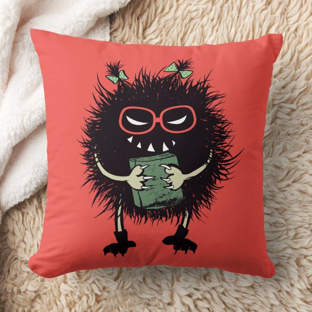 Evil Book Lover Character - Edgy Reading Throw Pillow (orange red pillow with an evil character with eyeglasses and ponytails grinning and holding a book)