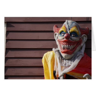 Evil scary clown happy halloween greeting card